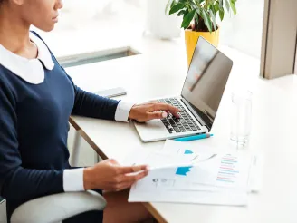 Woman working on a laptop