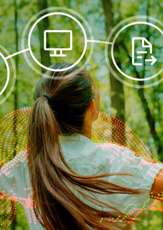 Woman walking through the woods surrounded by eco friendly icons