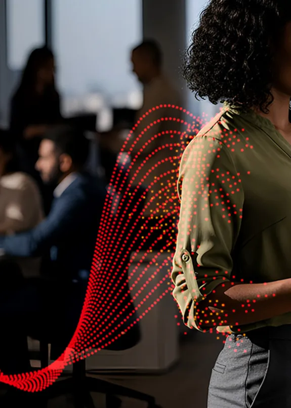 Woman using Sharp A3 MFP in an office space