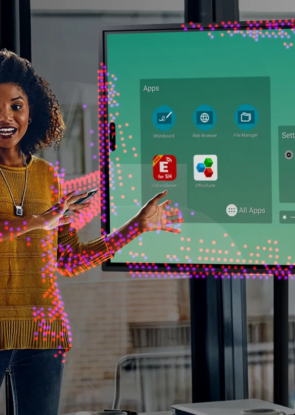 Woman displaying slides at a meeting using a Sharp Display 