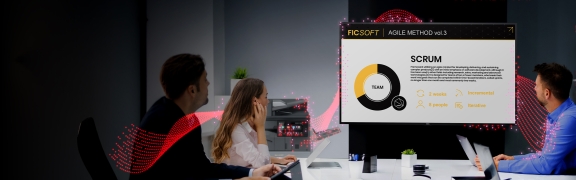 Three people having a meeting looking at a Sharp AV 